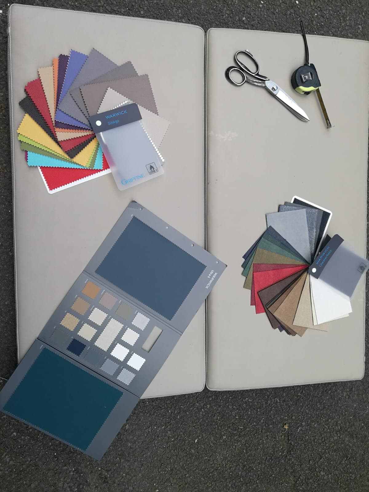 Fabric swatches, colour samples and upholstery tools