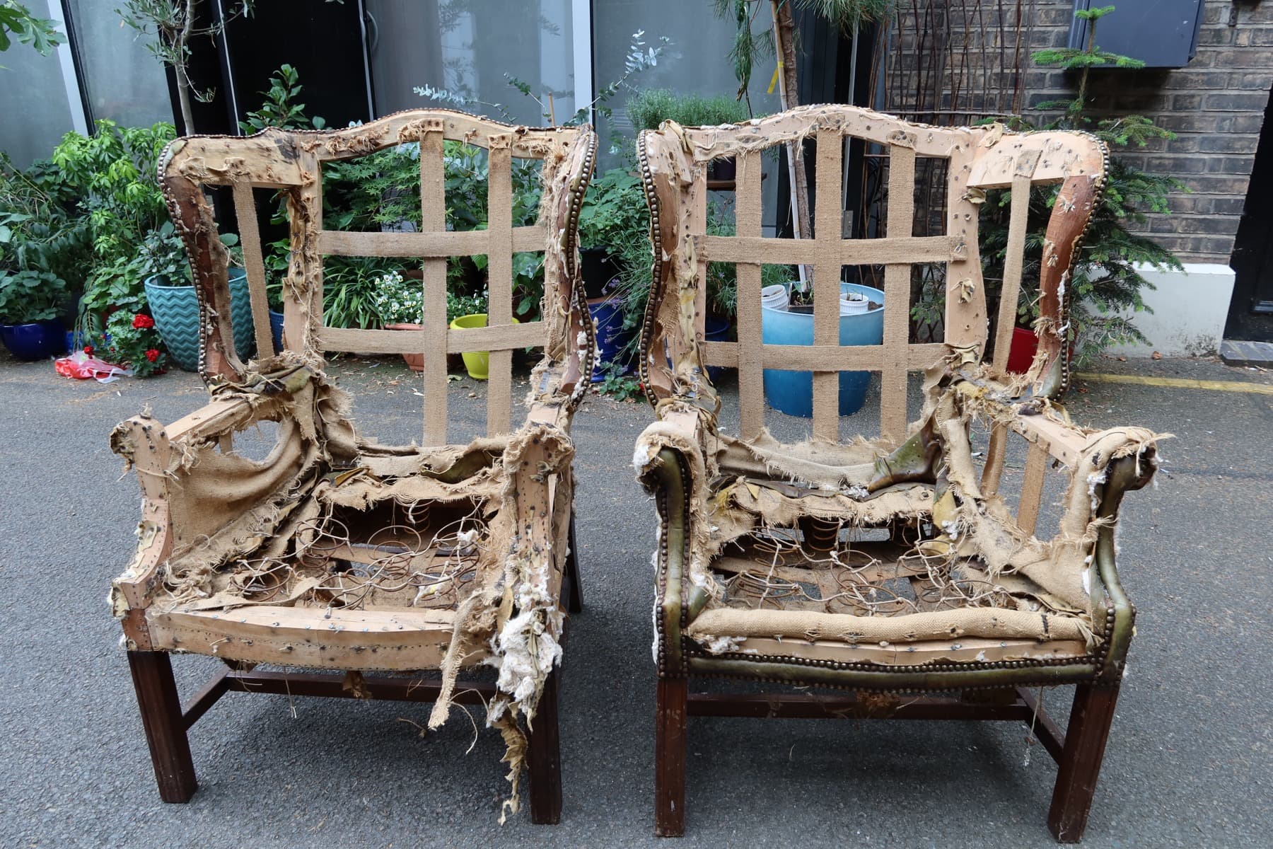 Separate workshop example showing antique chairs stripped to webbing and springs