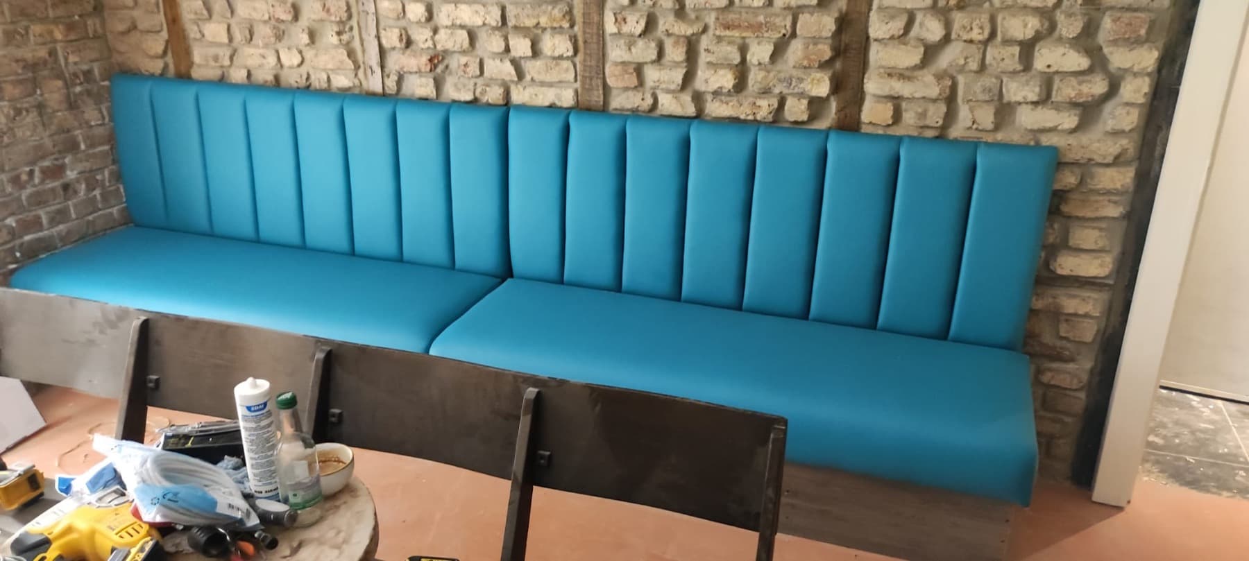 Blue restaurant banquette seating reupholstered in London