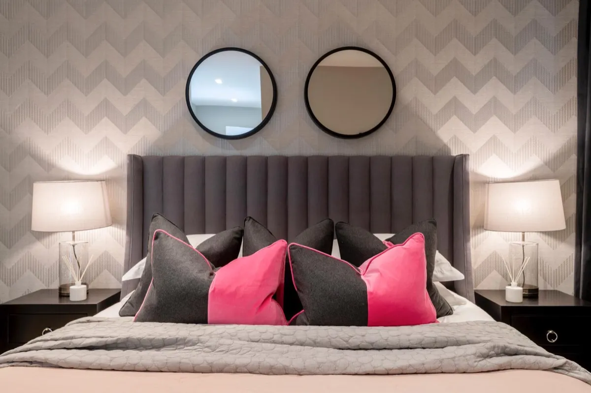 Upholstered bed frame with fabric headboard