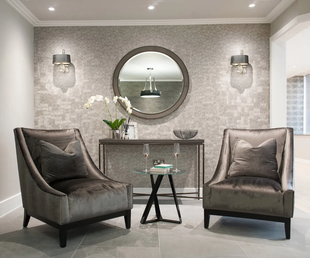 Armchair with round mirror