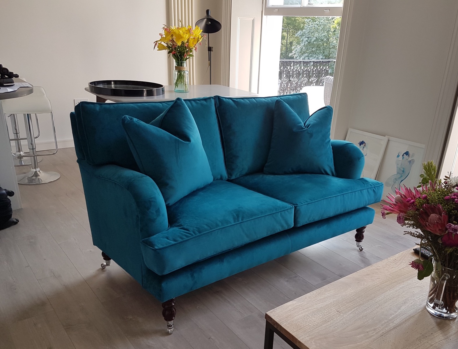 Howard-style sofa with deep seat cushions in a living room