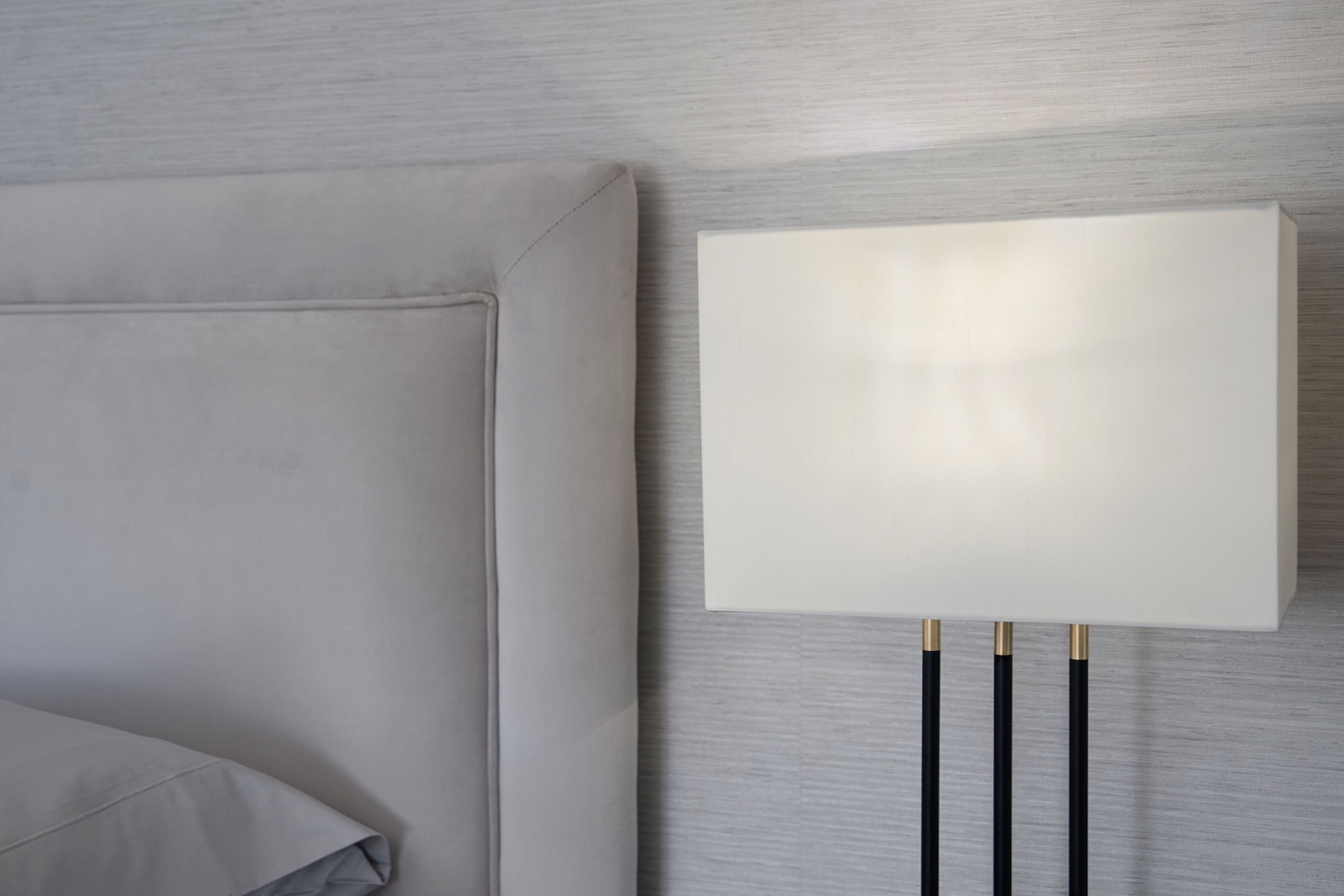 Bordered headboard with contrast piping detail