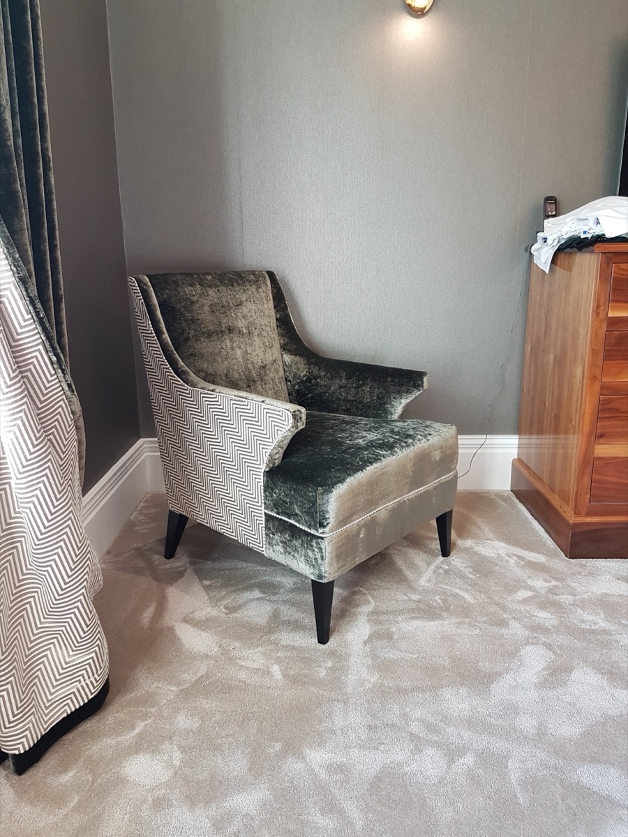 Burnham armchair reupholstered in soft fabric